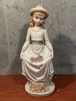 Vintage Ceramic Girl Figurine with Floral Accents