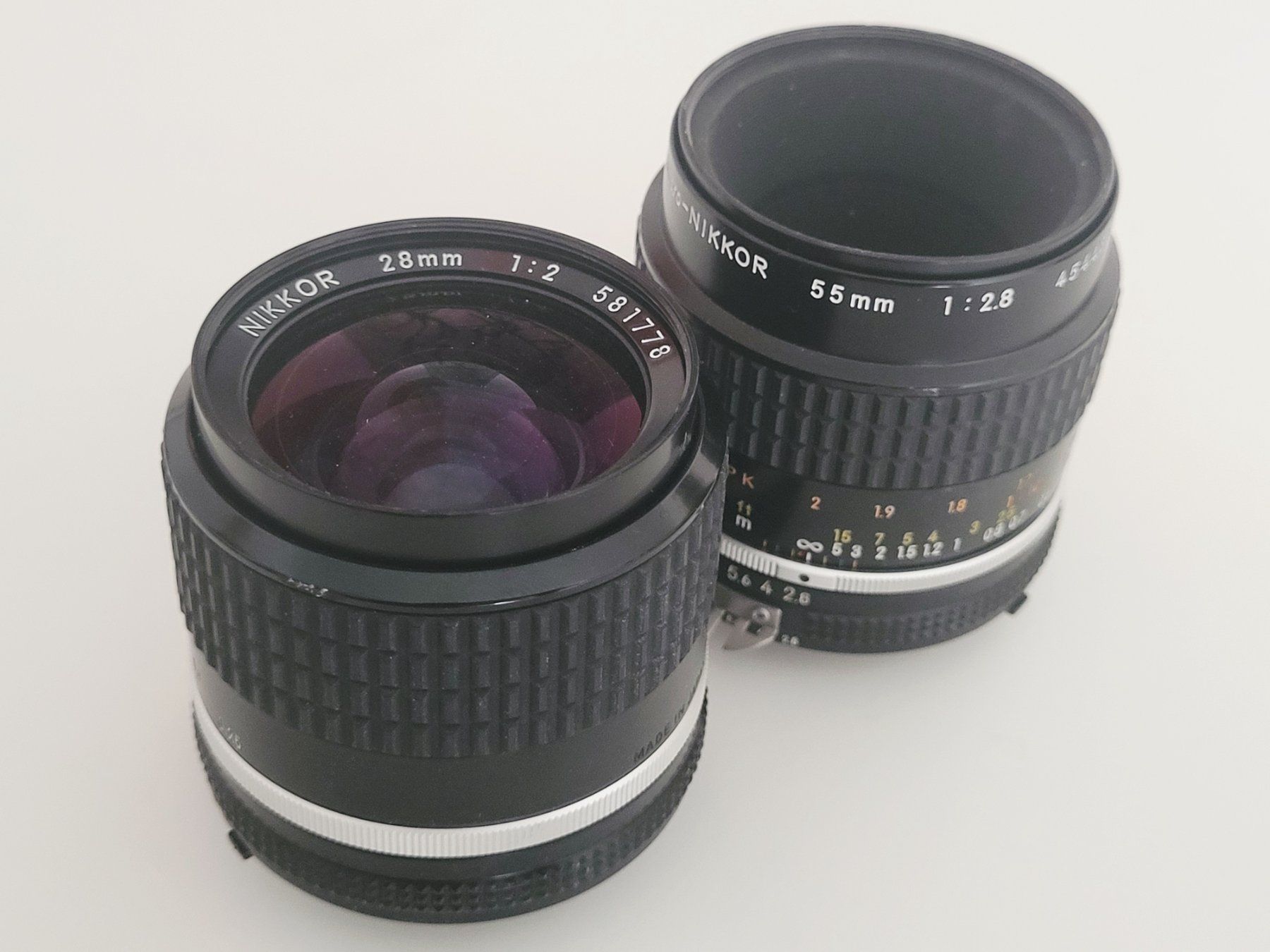 Nikkor Objektive: 2 Nikkor 28mm und 55 mm – Defekt aus Bern von Chalon1826