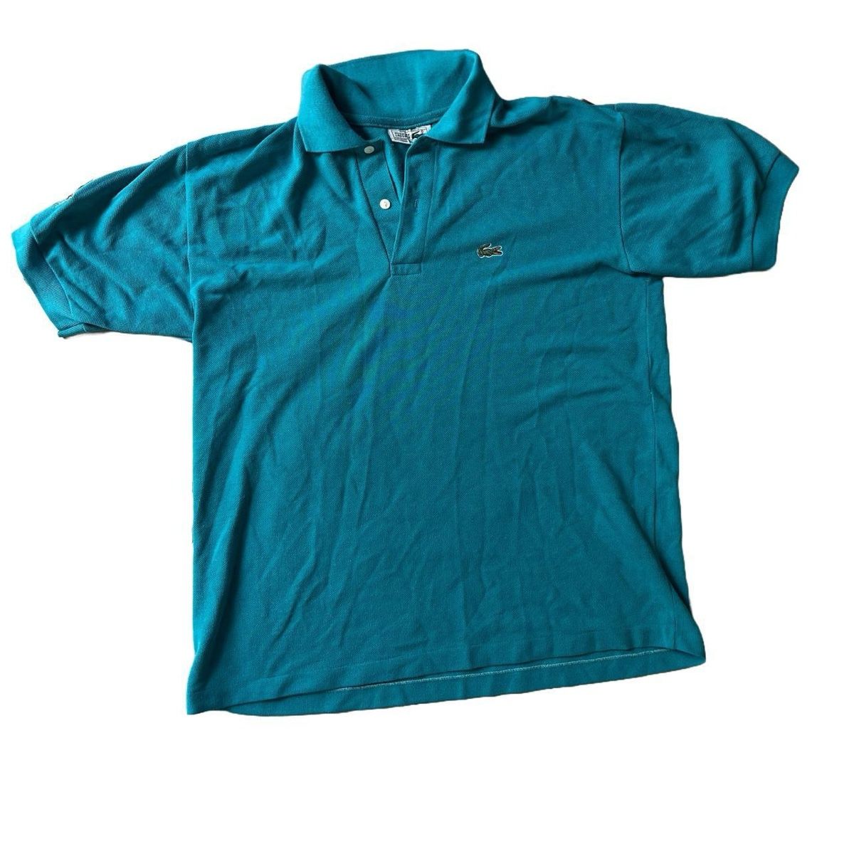Lacoste Magliette Polo: Lacoste Polo Tshirt Turquoise with Armprint – Usato da Riehen venduto da art_c76v