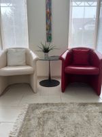 2 Leder-Clubsessel Pfister Classics, creme & rot