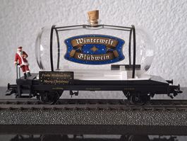 Märklin HO. Wagon citerne en verre avec figurine Père Noël