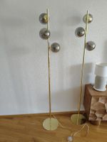 Zwei Stehlampen Messing mit Rauchglas Kugeln