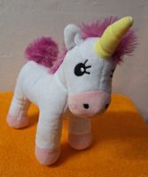 Weißes Einhorn mit rosa Schweif. Simba D-Fürth