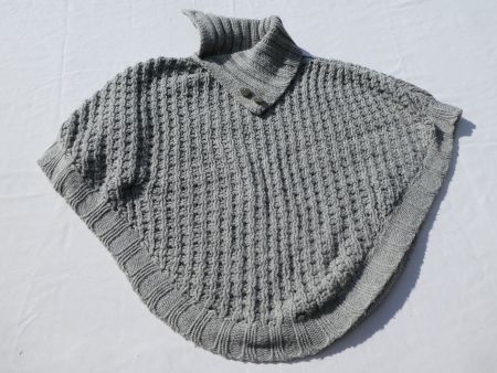 Strick-Poncho von Tschibo, Gr. 122/128