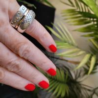 Bague en argent massif 925 avec inserts en or 18 K.