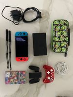 Nintendo Switch Konsole mit viel Zubehör und Spiele
