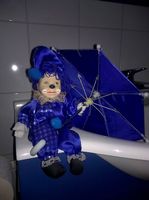 Clown mit Regenschirm