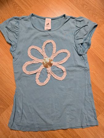 T-Shirt blau mit Blumenapplikation Grösse 134
