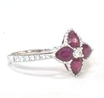 Rubinring 0.82ct, 15 Diamanten 0.13ct, 750 Weissgold, 1290.-