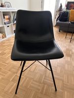 Schwarzer Designer Stuhl - Zeitloses Möbelstück für Ihr Zuha