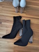 Schwarze Stiefeletten mit transparentem Absatz, Gr. 6