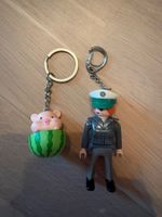 Playmobil Polizistin Schlüsselanhänger +1 weiterer Anhänger