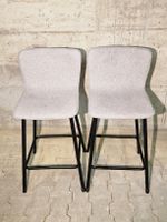 Moderner Barhocker mit Stoffbezug und Metallgestell