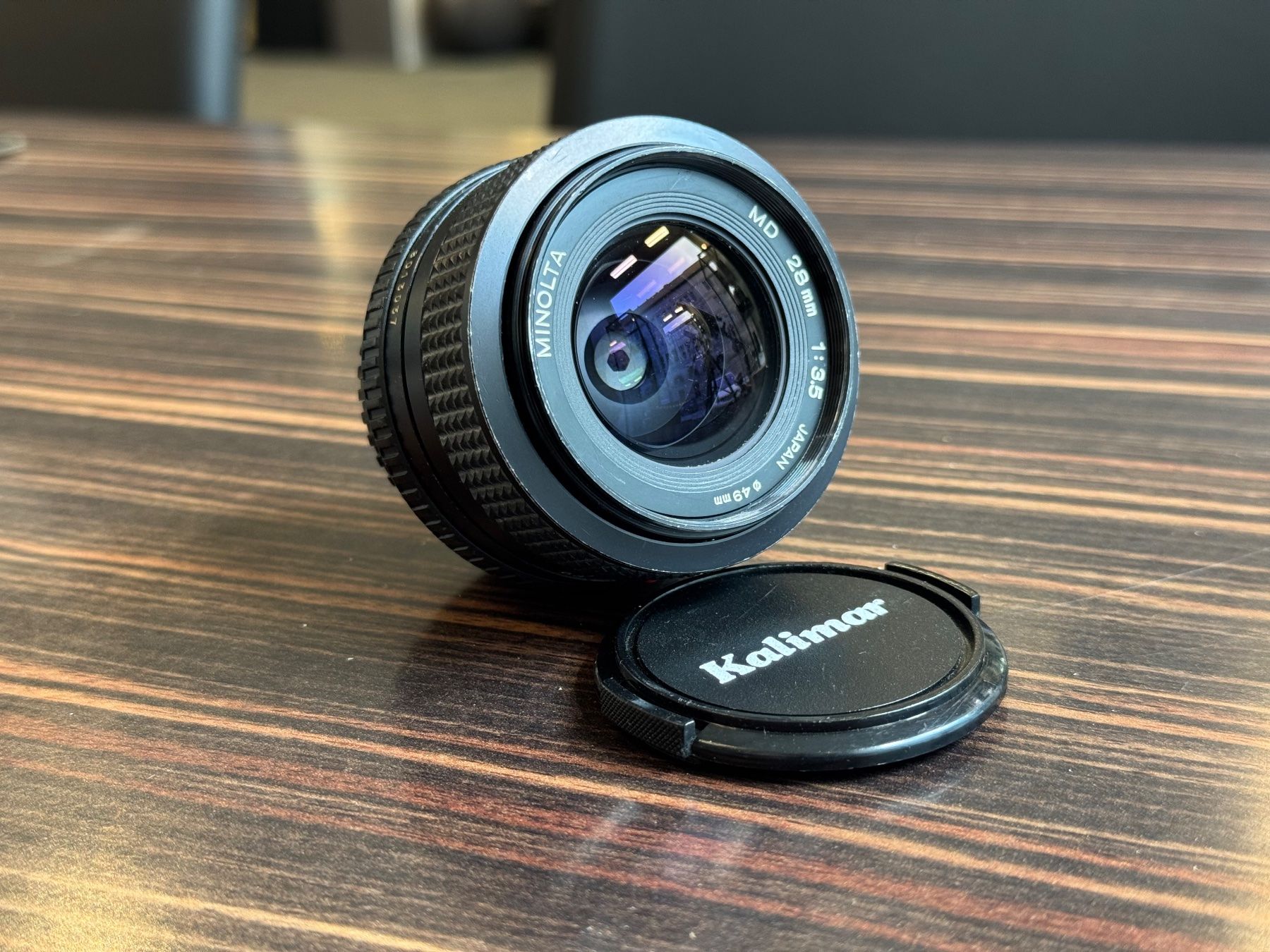 Minolta Obiettivi: Minolta MD 28mm 1:3.5 – Usato da Zürich venduto da KochphotoAG