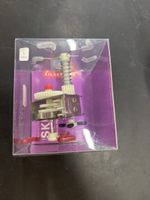 Kikkerland Skidum mechanisches Spielzeug mit Verpackung