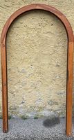 Porta in legno a tutto sesto
