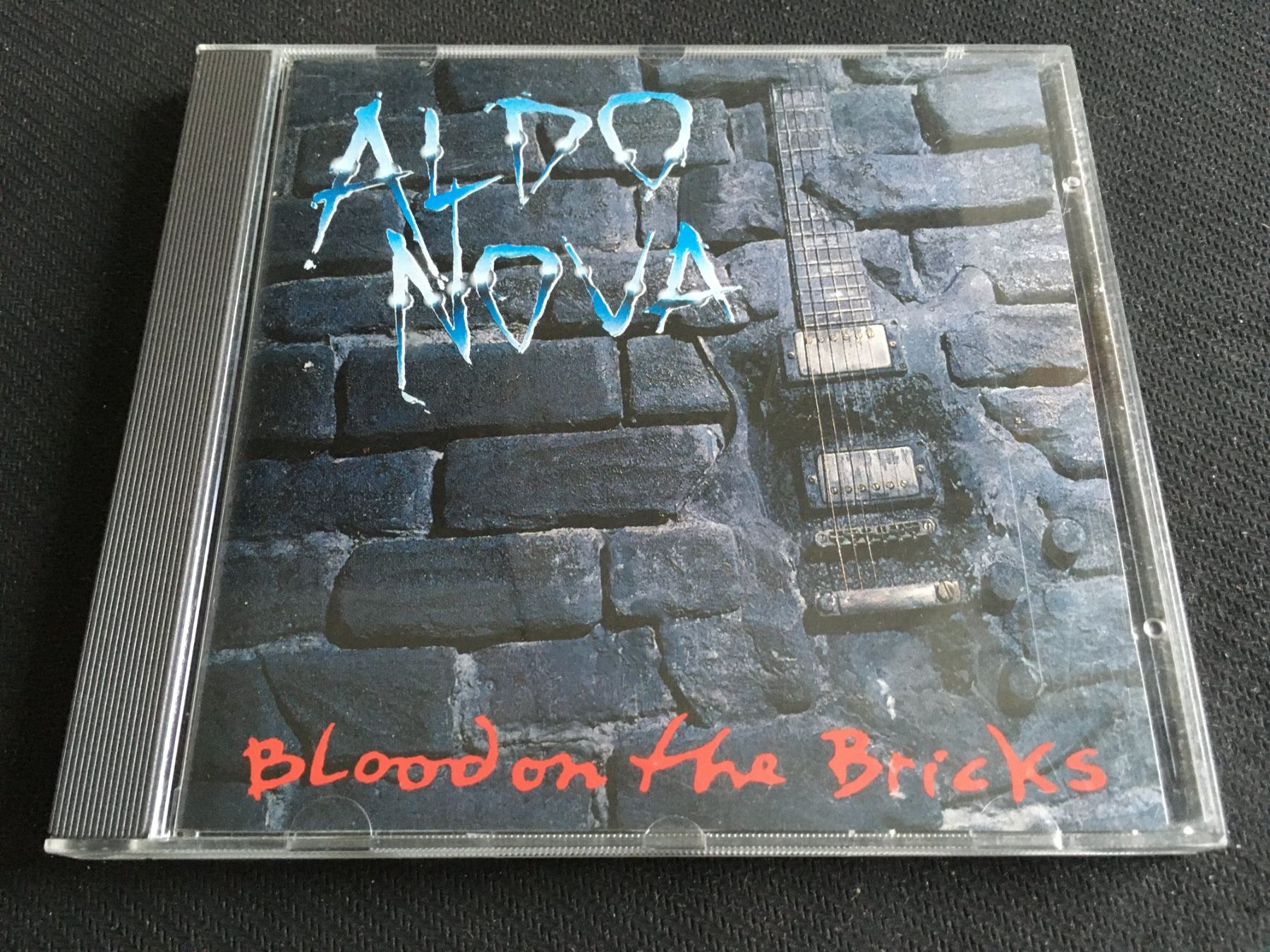 CD: Aldo Nova - Blood on the Bricks -CD- – Usato da St.Gallen venduto da MedienJoe