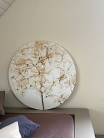Runde Wanddekoration mit Pflanzenmotiv