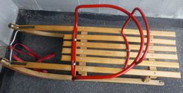 Davoser Holzschlitten mit Kindersitz
