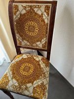 Versage Stühle gepolstert