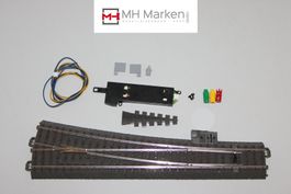 Märklin 24712 schlanke Weiche rechts + 74490 Antrieb C-Gleis