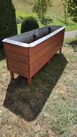 Hochbeet aus Holz mit Schneckenschutz