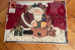 Adventkalender mit 24 Filzbeutelchen