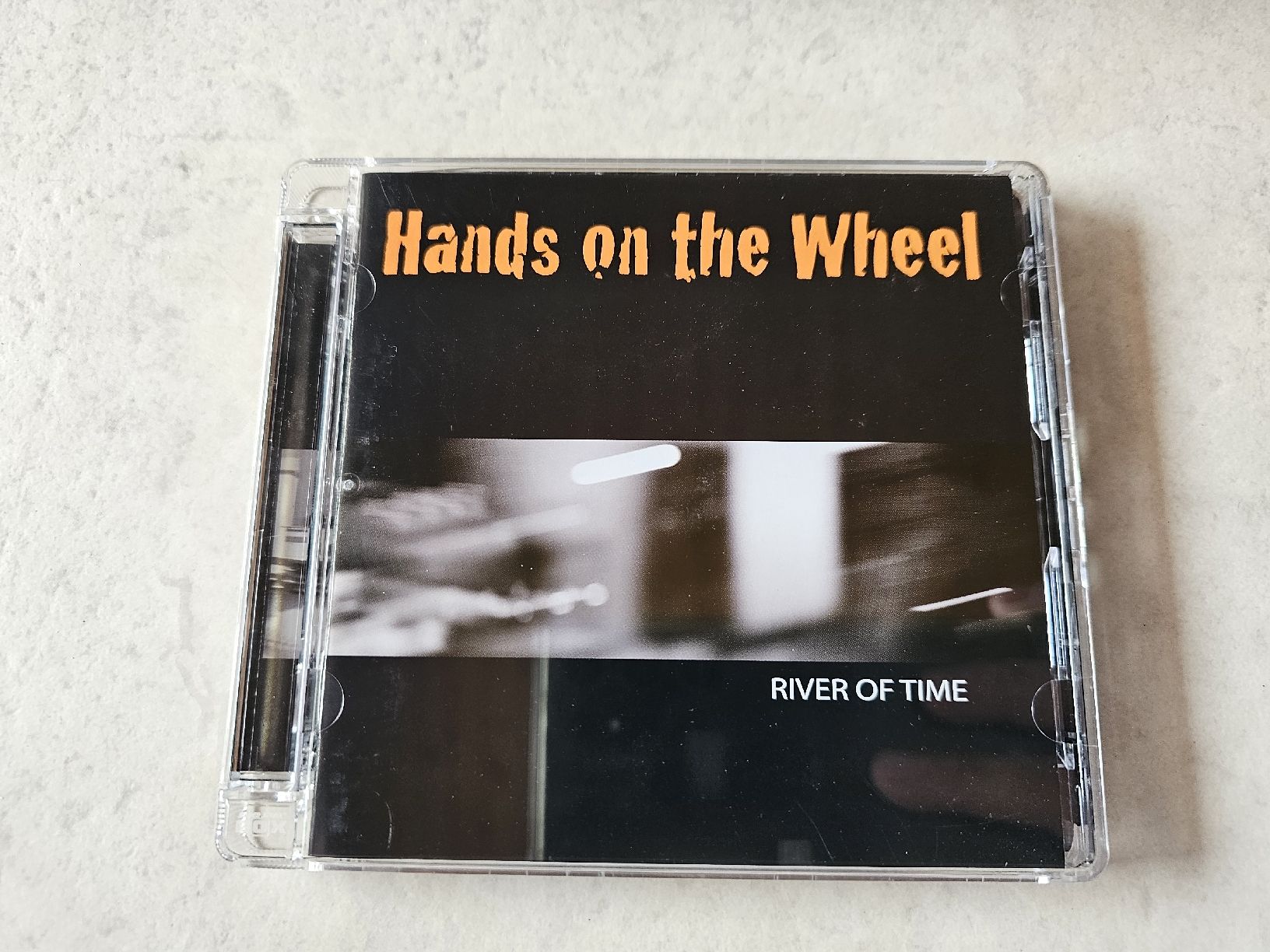 CD: Hands On The Wheel  -  River Of Time – Usato da Schneisingen venduto da backstore24