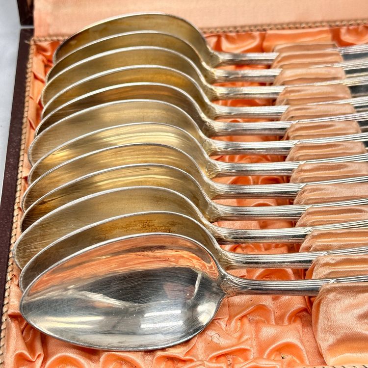 CHRISTOFLE : Partie de ménagère en métal argenté modèle coquille