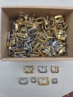 Lot d’env. 100 boucles ardillons montre – Inox