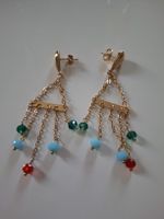 boucles d'oreilles pendantes avec pierres 
