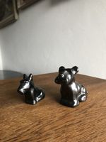 2 statuettes de chien en terre cuite