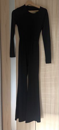 Combinaison noire manches longues dos nu taille S état neuf