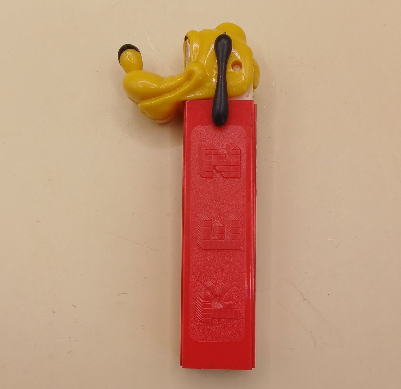 Pez Statuette: Vintage PLUTO Pez Spender 70er – Usato da Brittnau venduto da simionius 2