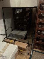 Cave à vin Fust noir porte vitrée bon état
