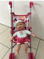 Puppe mit Spielzeugkinderwagen neuwertig 