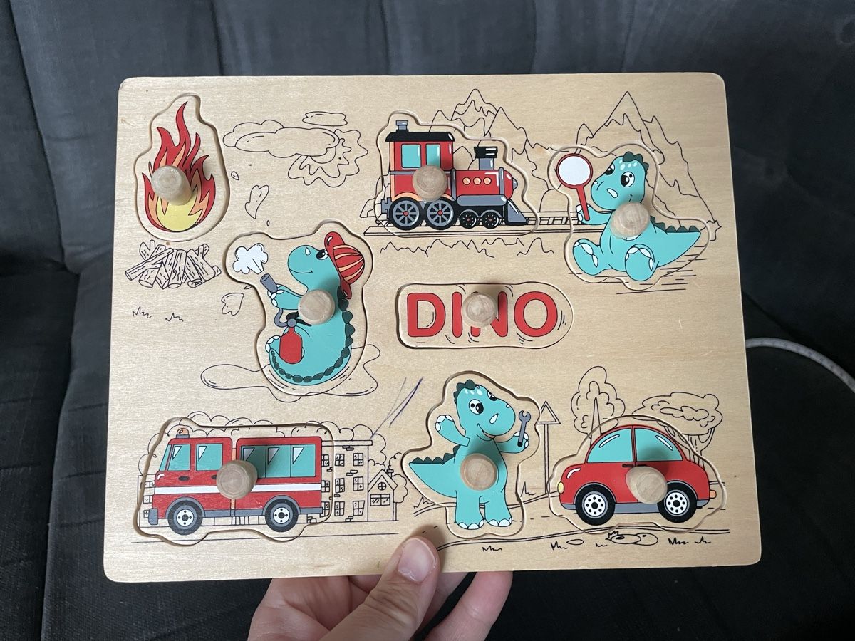 Spielzeuge: Dino Steckpuzzle aus Holz – Gebraucht aus luzern von plueschmors. 1