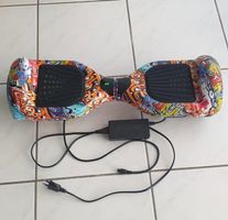 Hoverboard mit Ladegerät bunter Aufdruck guter Zustand