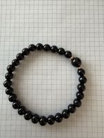 Schönes Onyx-Armband mit Roségold Akzenten, neuwertig
