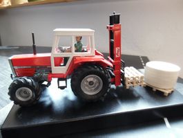 Massey Ferguson 3050A Traktor mit Fliegl Stapler,Ballen,Pal