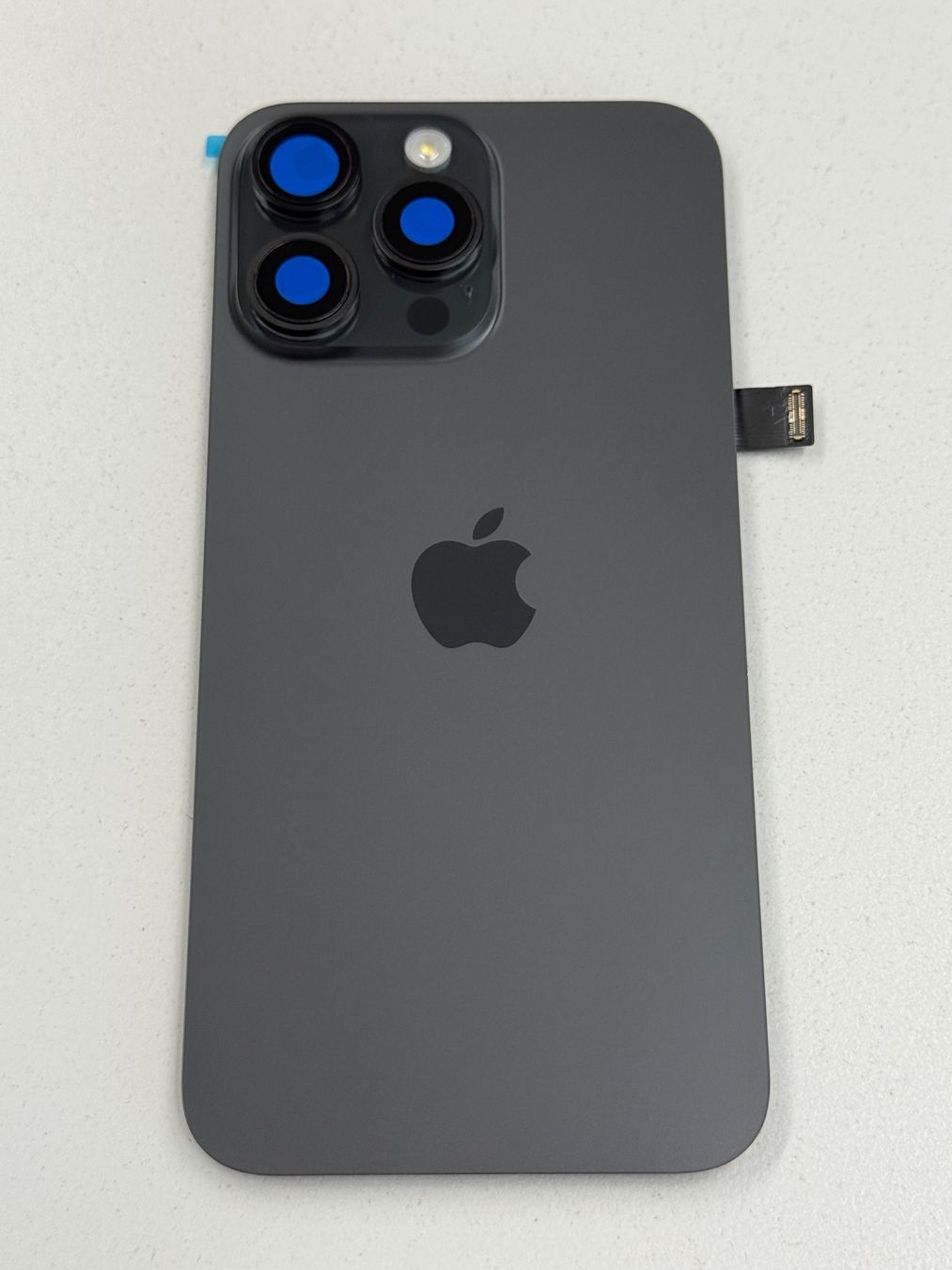 Apple Telefoni cellulari / Smartphones: Vitre Arrière pour iPhone 15 Pro Max avec NFC | Flash – Nuovo e nell'imballaggio originale da Zug venduto da ElPhone