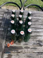 12 bouteilles en verre vert Bulach avec fermeture mécanique
