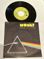 Pink Floyd. 1973. Money