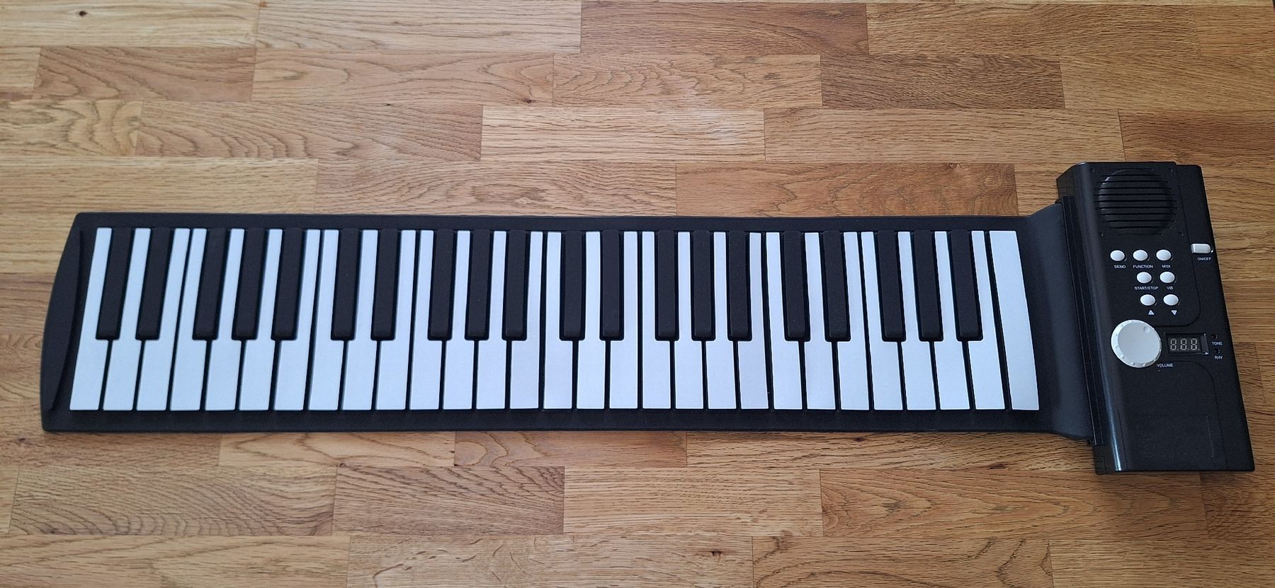 Strumenti musicali: Elektronisches Roll-Piano – Nuovo e nell'imballaggio originale da Zollbrück venduto da kir_gl88 1
