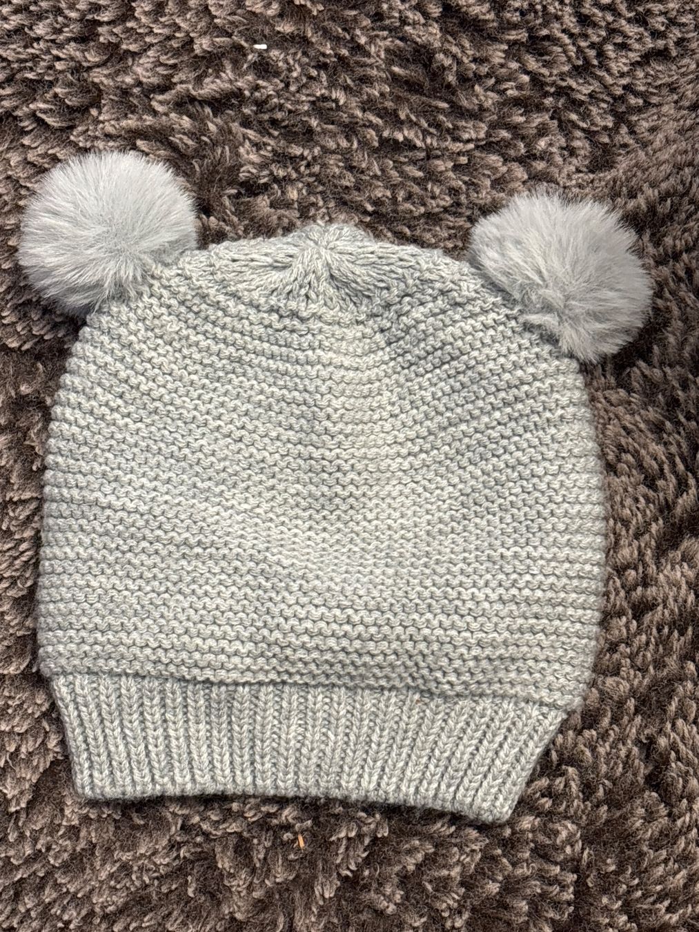 Altro abbigliamento per bambina: Wintermütze Grau mit Bommel, Grösse 104/116,m – Usato da Zürich venduto da engebrunau