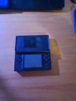 Nintendo DS Lite Rouge + Jeux et Accessoires