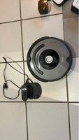 iRobot Roomba Saugroboter defekt mit Ladestation