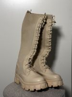 Bottes montantes beige lacets semelle crantée taille 38