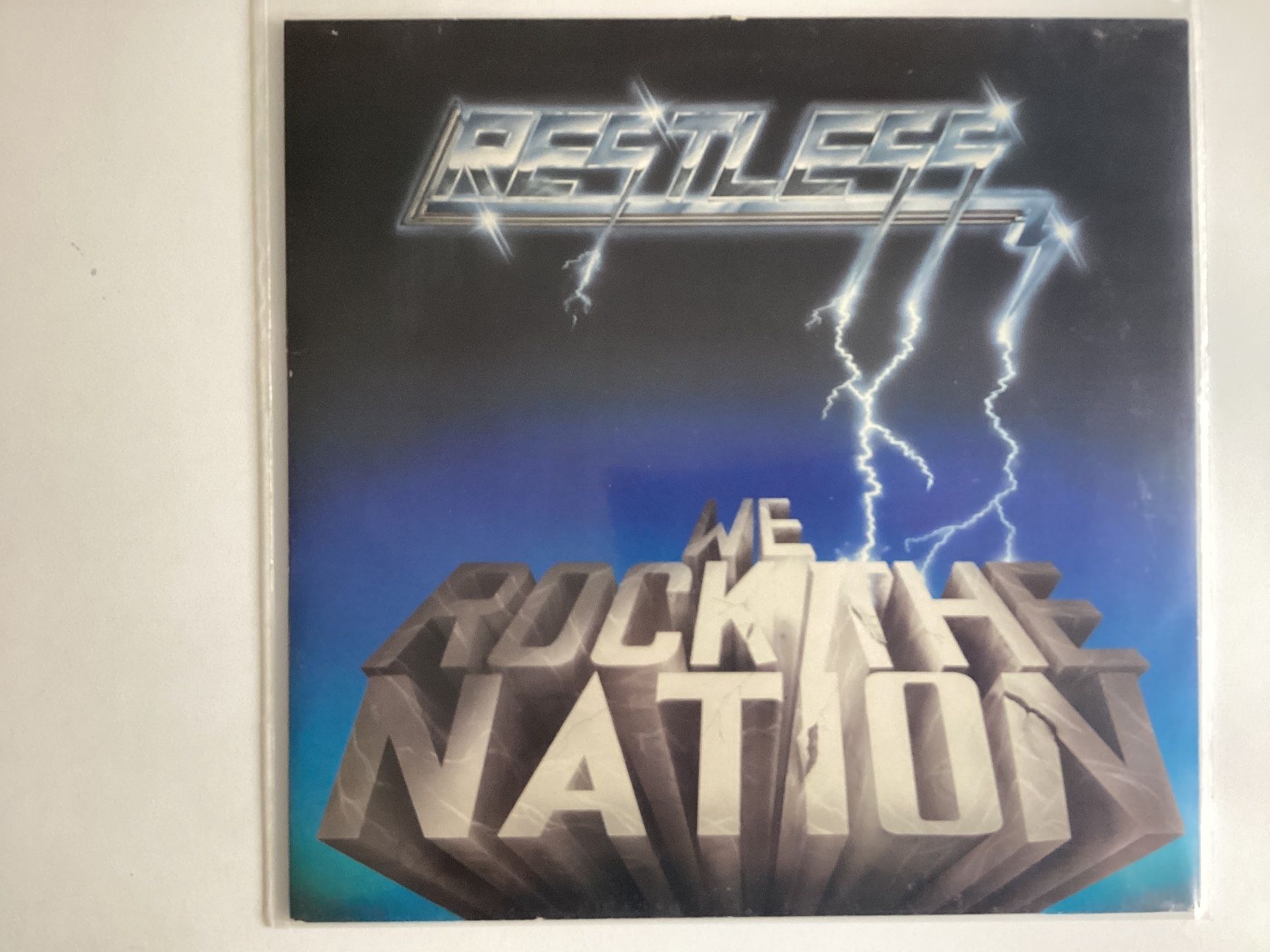 Vinyles: Restless LP - We Rock The Nation – D'occasion à Gutenswil par Hamzian