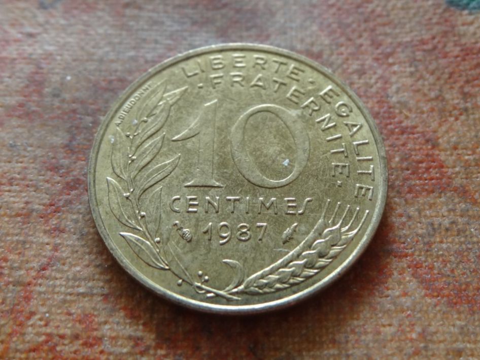 Tutti le monete: FRANCE  10 Centimes  1987  (P) – Usato da Romanel-sur-Lausanne venduto da Swift13